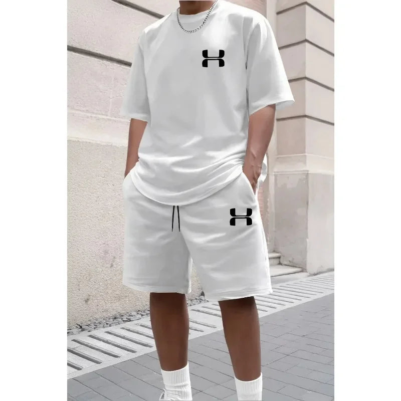 White oversized knit set with short sleeve tee and drawstring shorts for athletic training.