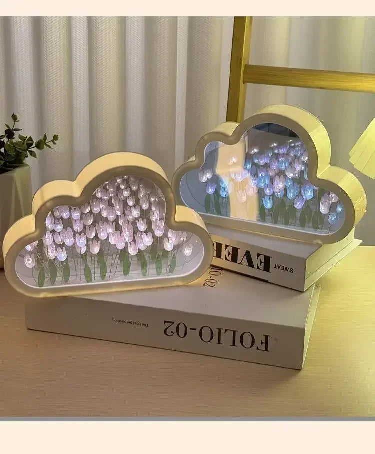 Cloud-shaped mirror with LED tulip flowers for ambient desk decor, creating a soft glow.