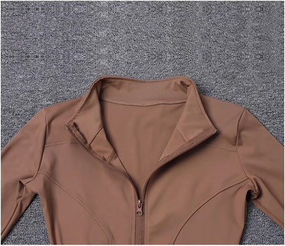Brown polyester long sleeve sport jacket with a fitted zip-up design for gym training and yoga.