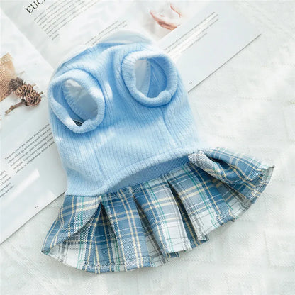 Knitted dog dress with a plaid skirt for everyday outings