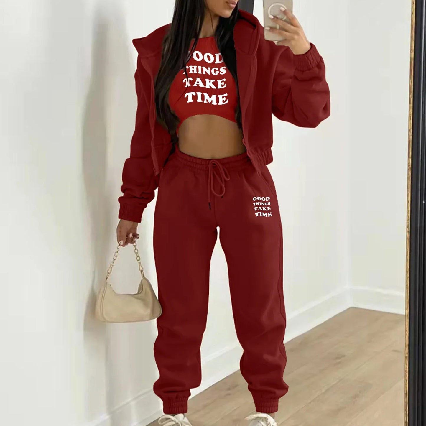 Deep red hooded knit sweater set with white letter print for a relaxed lounge outfit.
