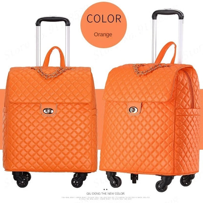 Orange quilted PU leather retro rolling suitcase with a top handle, chain accent, and twist-lock closure on wheels.
