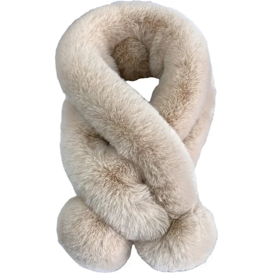Beige plush faux-fur cross scarf with a fluffy pull-through slot and pom-pom ends.