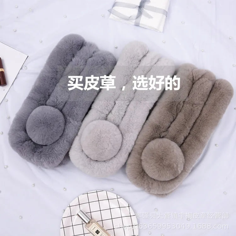 Three fluffy rabbit fur triple tube short scarves in dark gray, light gray, and brown, with pom-poms.