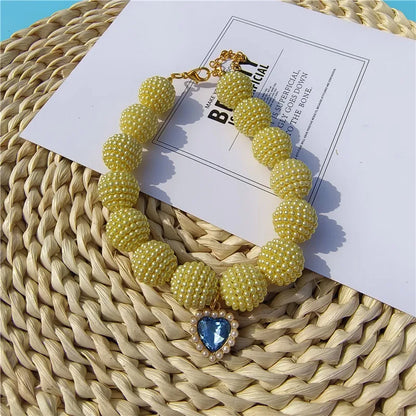 Heart-detail pet collar with pearl-style accents