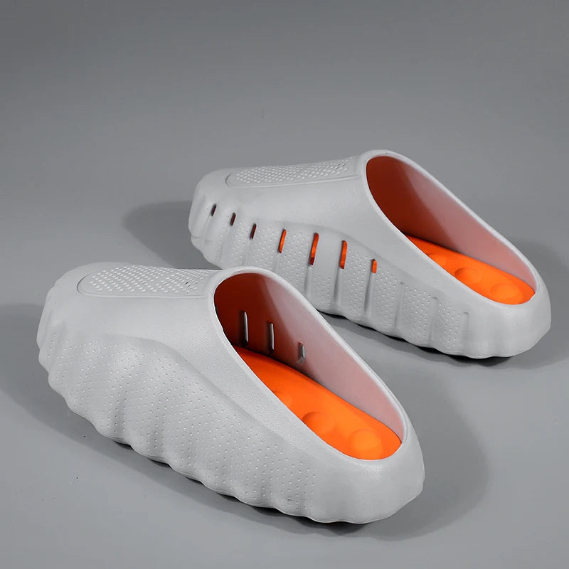White, rubber, textured platform sandals with orange cushioned insoles for daily wear.