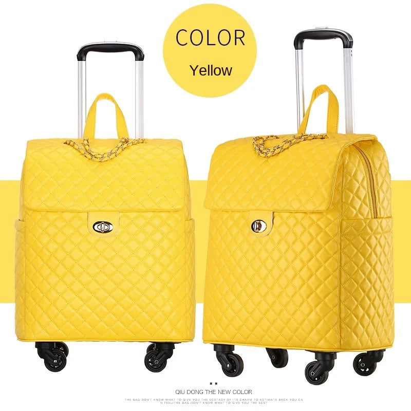 Yellow quilted PU leather retro rolling suitcase with gold chain accent and twist lock.
