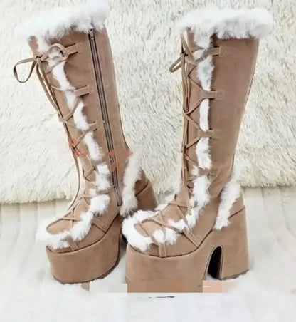 Brown suede platform wedge snow boots with white faux fur trim, lace-up front, and side zippers.