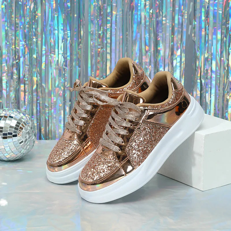 Rose gold sequin sneakers with thick white soles, metallic trim, and matching laces.