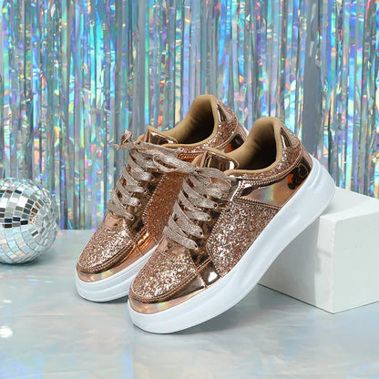 Rose gold sequin sneakers with thick white soles, metallic trim, and matching laces.