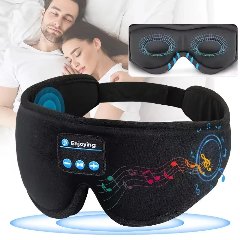 Black soft fleece wireless Bluetooth sleep mask with built-in speakers and control panel.