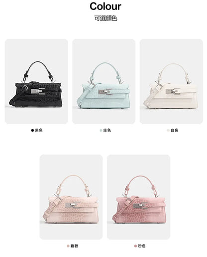 Structured faux leather crossbody bag with crocodile texture, metal hardware, and adjustable strap for daily use.