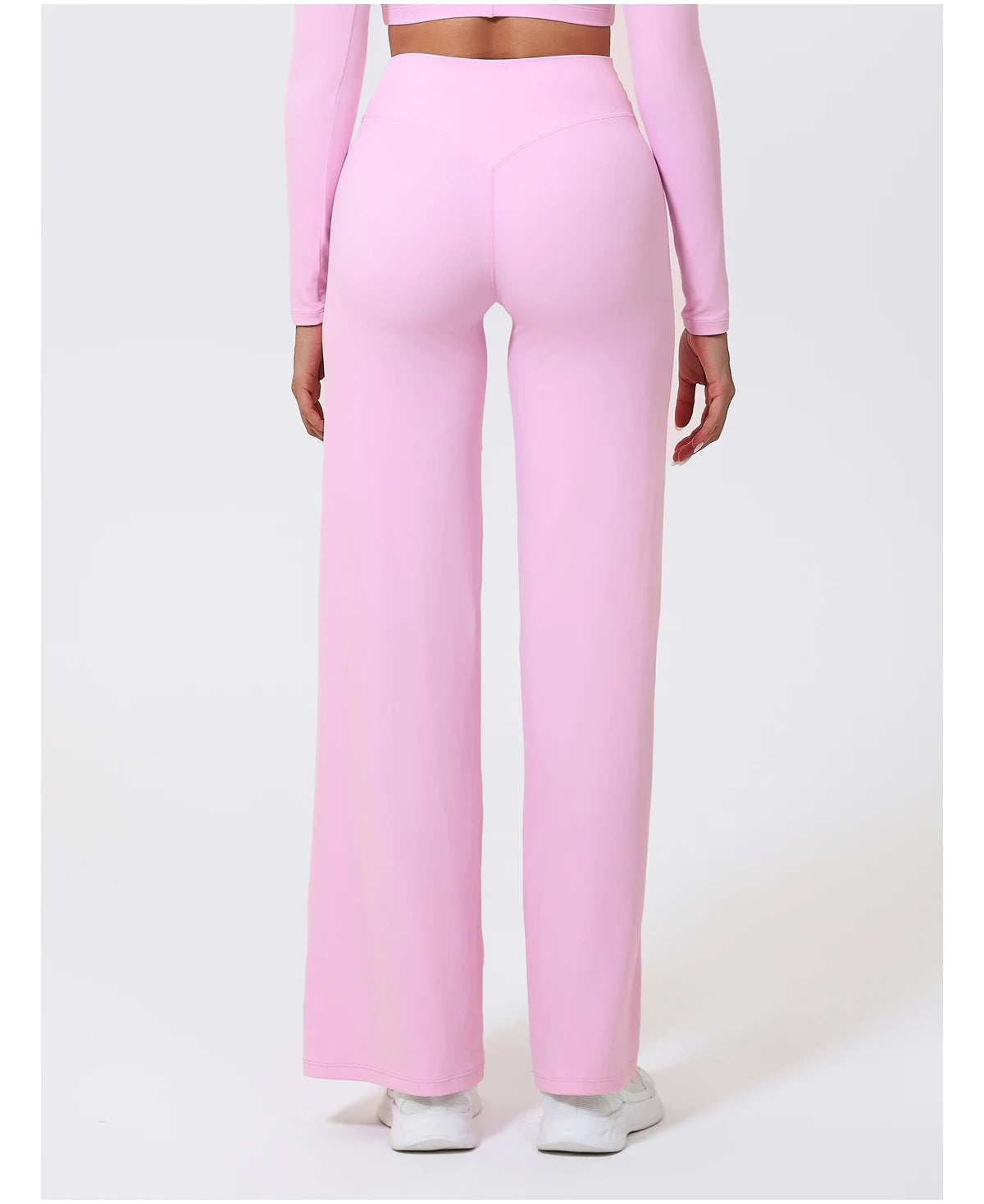 Light pink high waist stretchy leggings in quick-dry knit material for workouts.