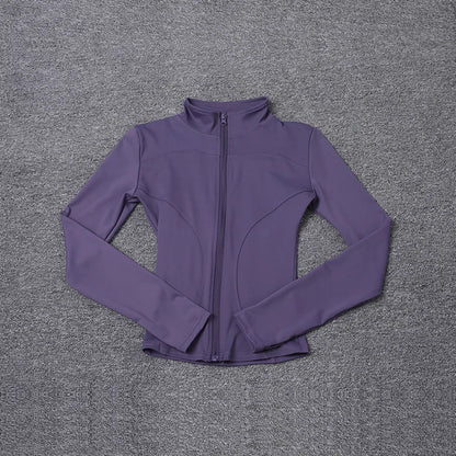 Purple long sleeve jacket in stretchy polyester with a zip-up front for gym training and yoga.