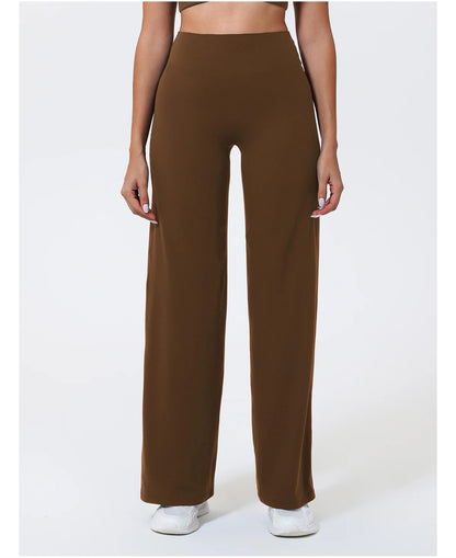 Dark brown high waist sculpting leggings in a stretchy knit fabric for athletic training.