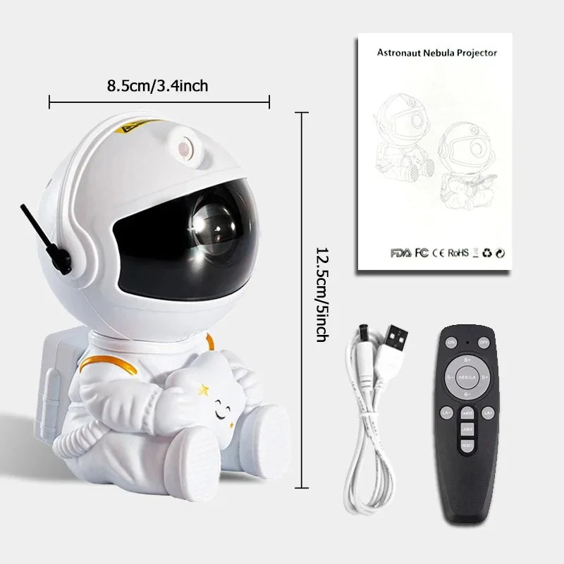 White astronaut LED galaxy night light with a remote and USB cable for bedroom star projection.
