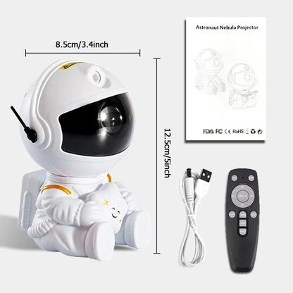 White astronaut LED galaxy night light with a remote and USB cable for bedroom star projection.