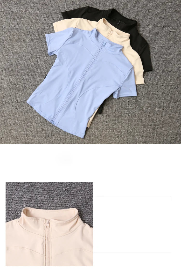 Black, beige, and blue short-sleeve sculpting training top with full zip for workout layering.