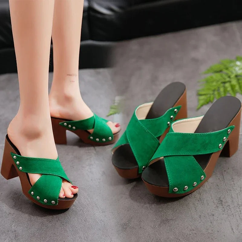 Green flock platform sandals with silver rivets and peep toe design for casual summer wear.