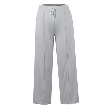 Light gray high waist wide leg pants with a drawstring and fleece lining for comfortable cold weather wear.
