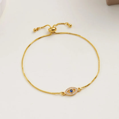Bracelet with a heart-shaped zircon evil eye charm