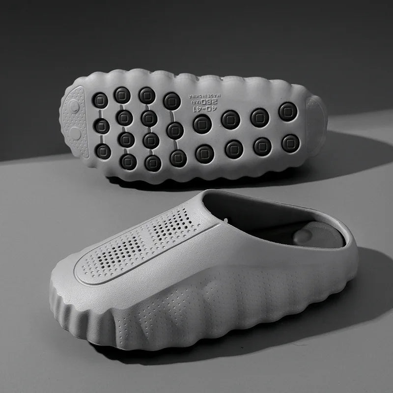 Grey EVA slip-on sandals with non-slip massage soles for shower use.