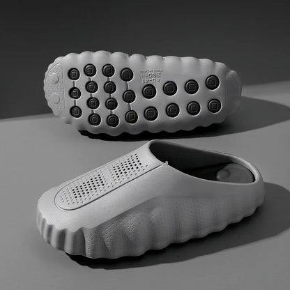 Grey EVA slip-on sandals with non-slip massage soles for shower use.