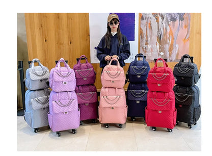 Quilted nylon rolling backpacks in light blue, purple, magenta, pink, navy, red, and black with chain accents.