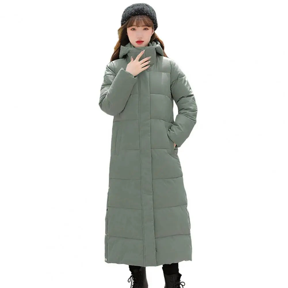 Women's long hooded coat with zip closure and side slits
