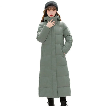 Women's long hooded coat with zip closure and side slits