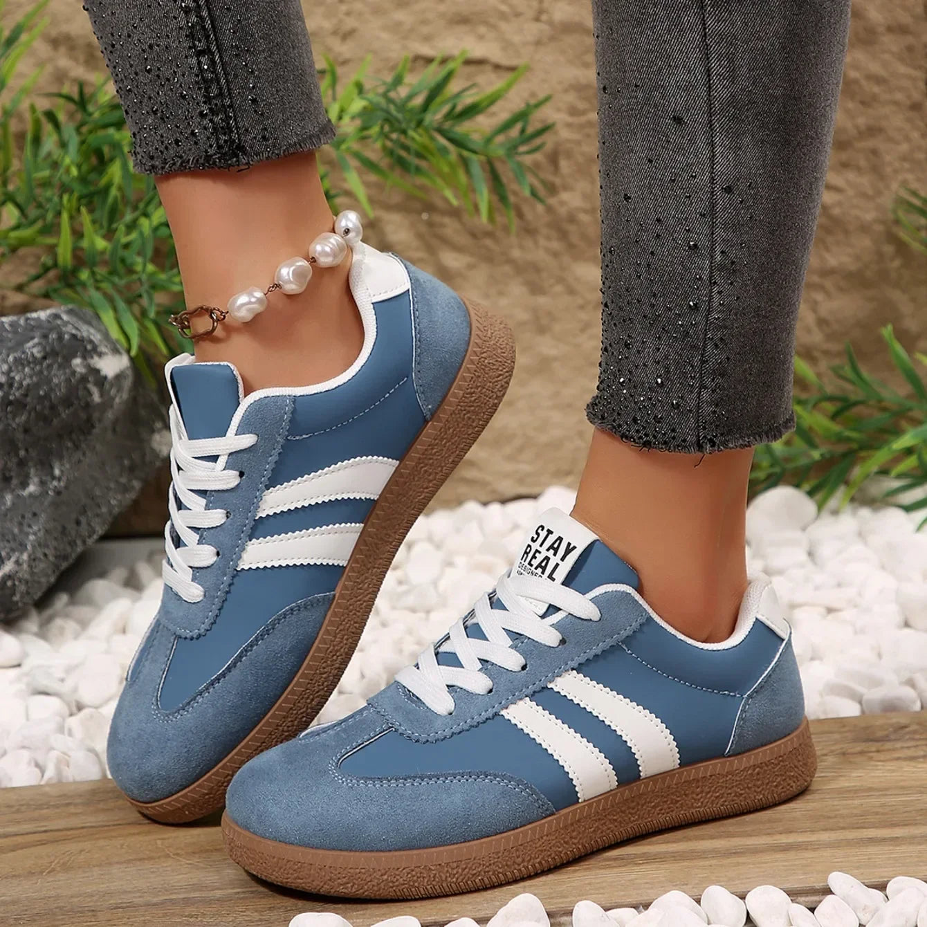 Blue suede and white leather slip-on sneakers with gum soles for daily casual wear.
