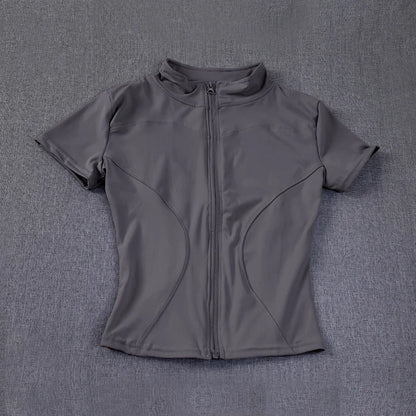 Grey short-sleeve, full-zip stand collar, sculpting yoga top with fitted seams for workout sessions.