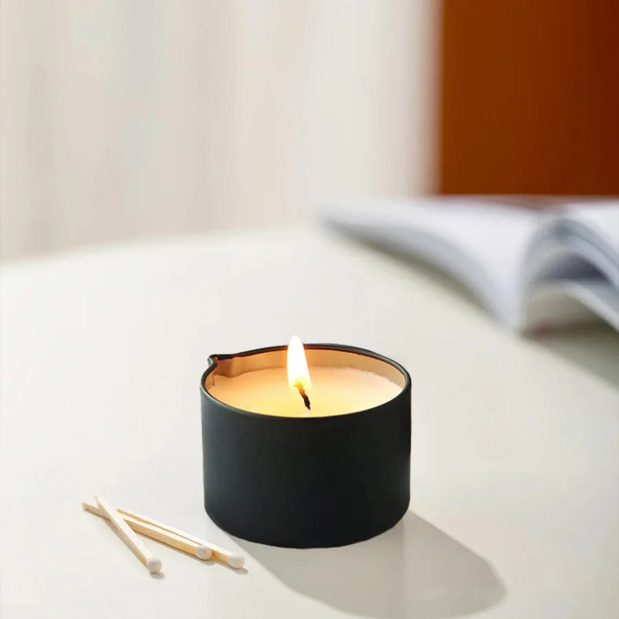 Scented massage oil candle for an evening ritual