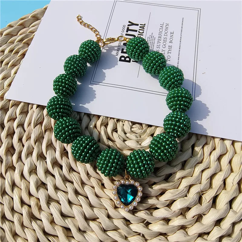 Heart-detail pet collar with pearl-style accents