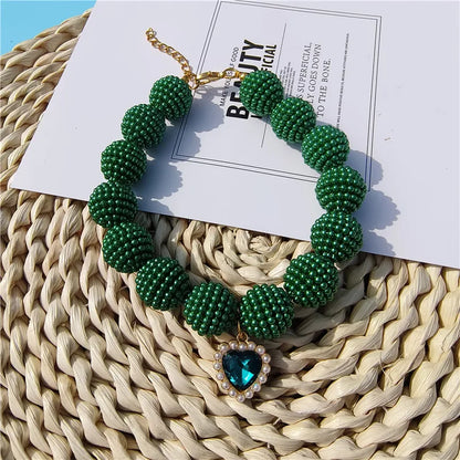 Heart-detail pet collar with pearl-style accents