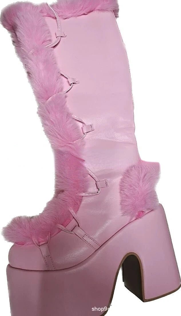 Pink faux leather platform wedge mid-calf boot with faux fur trim, lace-up front, and chunky heel.