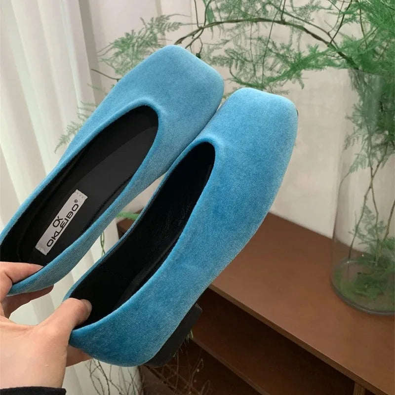 Bright blue suede square toe slip-on flats for daily wear.