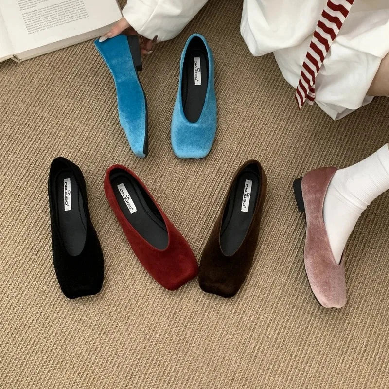 Multi-colored suede square toe slip-on flats with cushioned insoles for everyday wear.