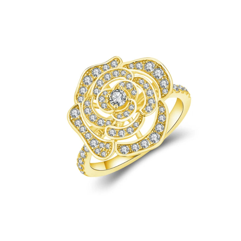 Gold-plated silver ring shaped like a camellia flower, paved with sparkling cubic zirconia stones.