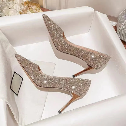 Gold glitter pointed-toe slim heel dress shoes for wedding events.