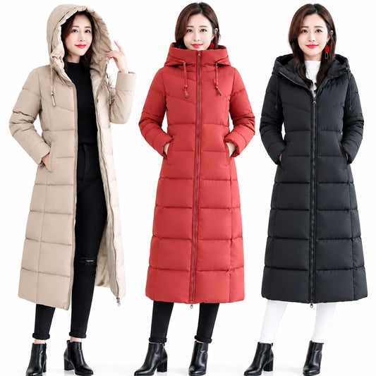 Three women modeling long horizontally quilted hooded puffer coats in beige, red, and black.