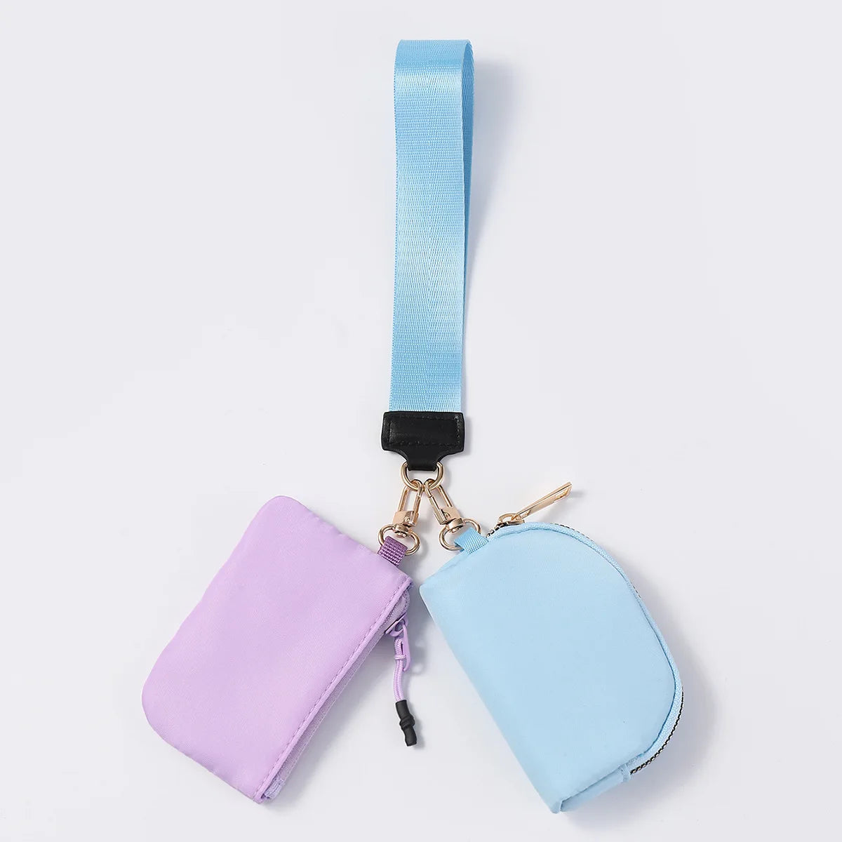 Lavender and blue nylon dual pouch wristlet wallet with zip closure for holding cards and coins on the go.