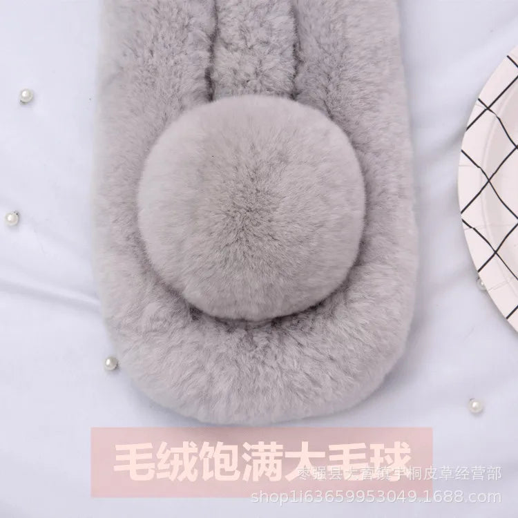 Grey rabbit fur triple-tube scarf featuring a large pom-pom detail.