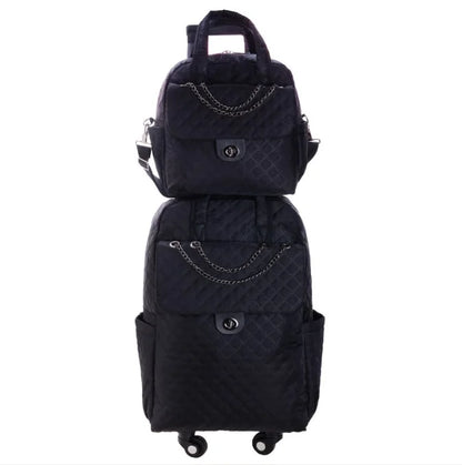 Black quilted rolling backpack and matching handbag set with chain accents and turn-lock closures.