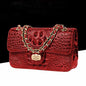Textured Leather Crossbody Bag With Crocodile Pattern And Durable Build And Everyday Chain Strap