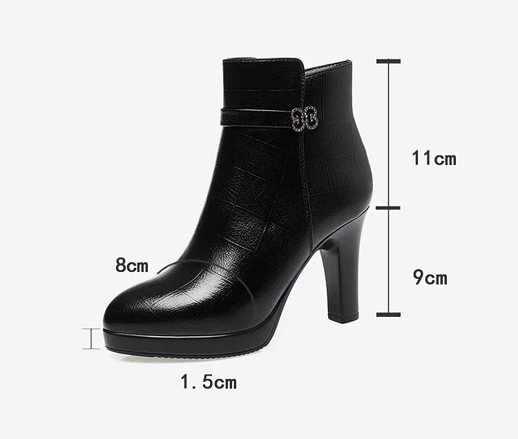 Black leather ankle boot with a 9cm block heel, decorative side buckle, and dimensional measurement overlays.