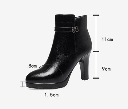 Black leather ankle boot with a 9cm block heel, decorative side buckle, and dimensional measurement overlays.