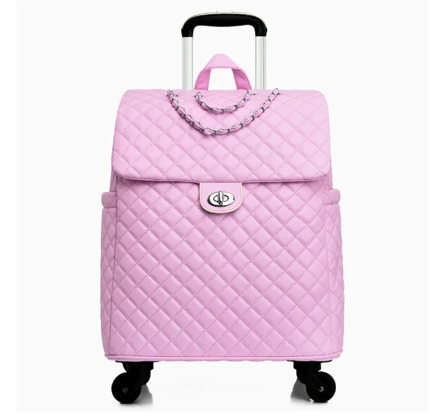 Pink quilted faux-leather rolling luggage with a chain detail, turn-lock closure, and retractable handle.
