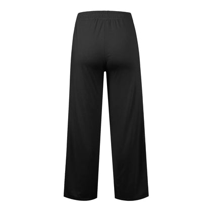 Black high waist fleece-lined flowy pants for winter wear.