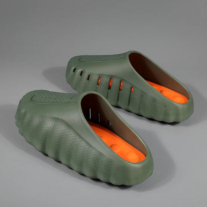 Olive green textured platform sandals with orange cushioned insoles for daily wear.